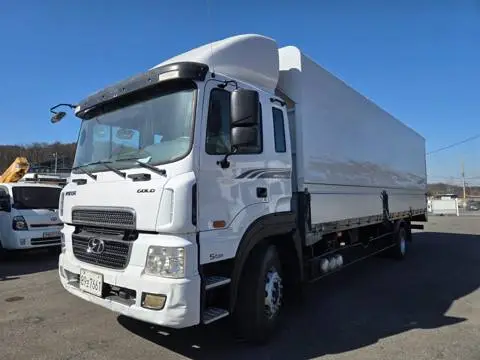 현대 메가트럭 5톤 윙바디 2014년식 메가트럭 와이드캡 운전석 쪽 외관