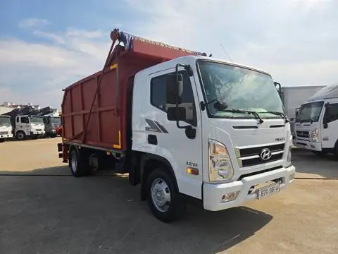 현대 마이티 3.5톤 집게차 2019년식 마이티 집게차 조수석 쪽 전측면